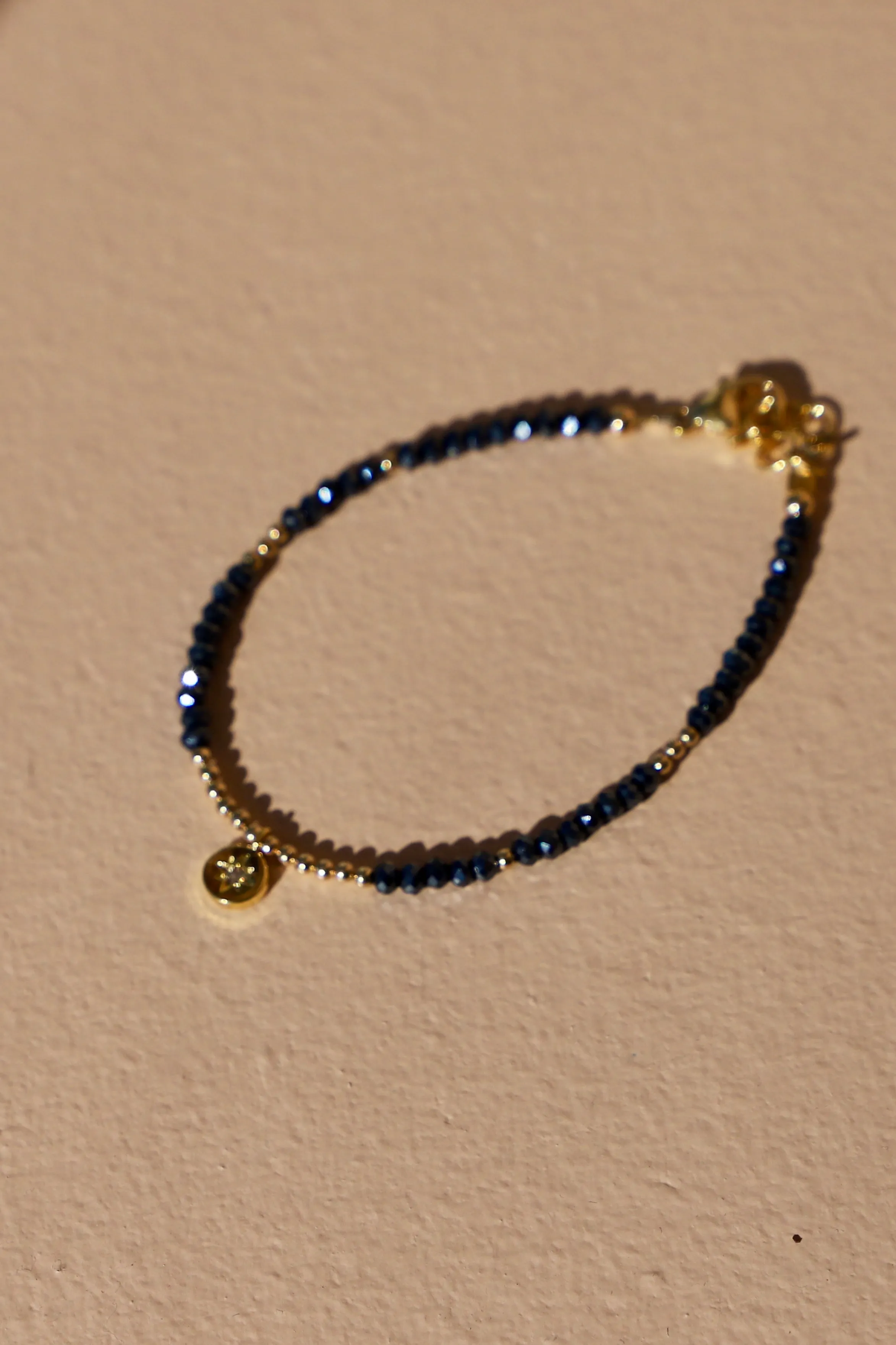 BEADED STAR MEDALLION BRACELET